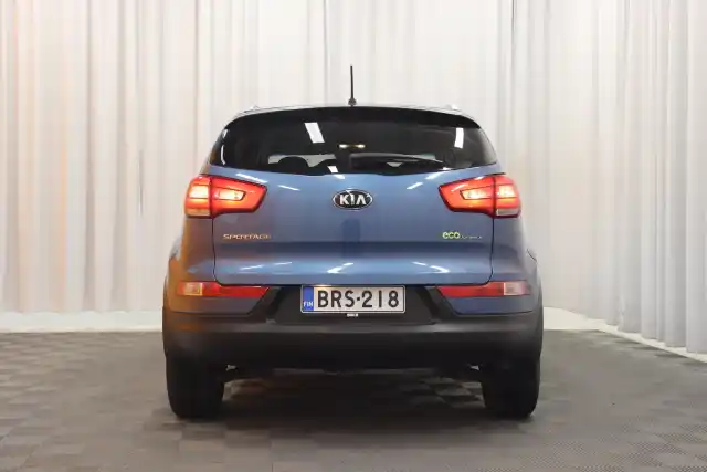 Sininen Maastoauto, Kia Sportage – BRS-218