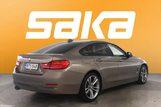 Ruskea Sedan, BMW 420 – BTS-548