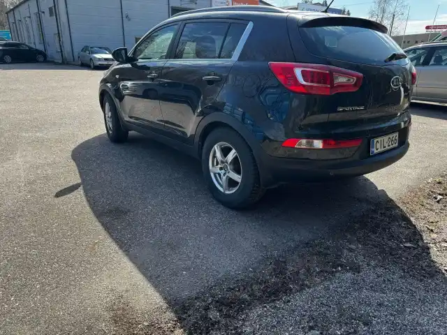 Musta Maastoauto, Kia Sportage – CIL-266