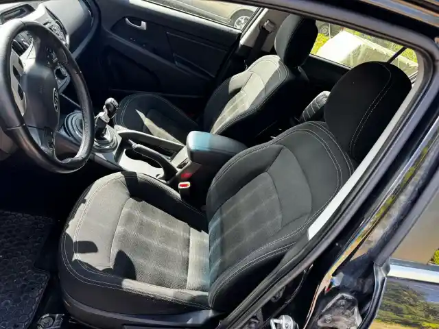 Musta Maastoauto, Kia Sportage – CIL-266