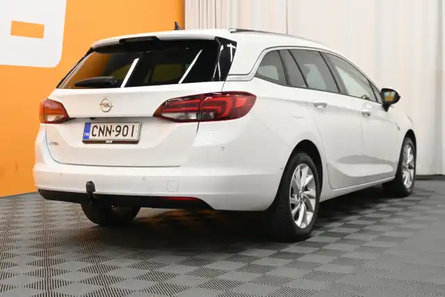 Valkoinen Farmari, Opel Astra – CNN-901