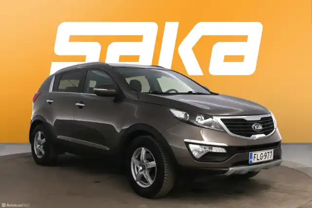 Ruskea (beige) Maastoauto, Kia Sportage – FLG-977