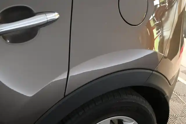 Ruskea (beige) Maastoauto, Kia Sportage – FLG-977