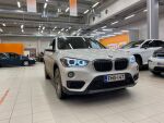 Valkoinen Maastoauto, BMW X1 – FMG-147, kuva 1