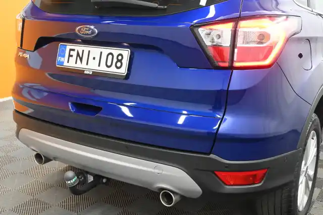 Sininen Maastoauto, Ford Kuga – FNI-108