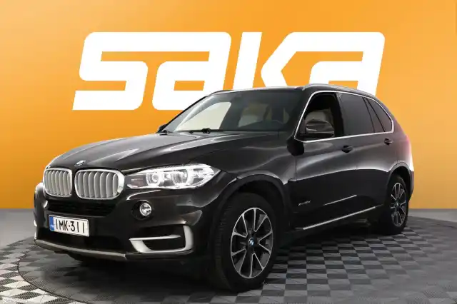 Ruskea Maastoauto, BMW X5 – IMK-311