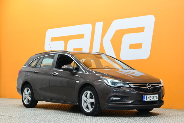 Ruskea Farmari, Opel Astra – INE-374