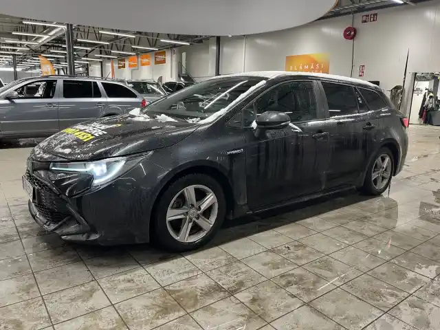 Musta Farmari, Toyota Corolla – IOU-322