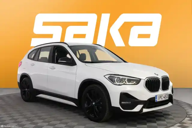 Valkoinen Maastoauto, BMW X1 – IPC-453