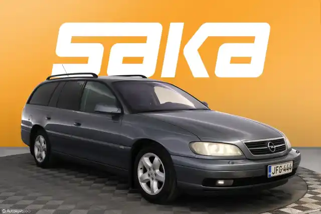 Harmaa Farmari, Opel Omega – JFG-444