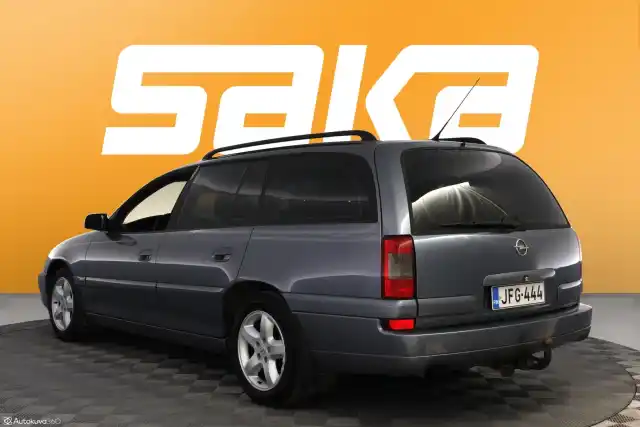Harmaa Farmari, Opel Omega – JFG-444