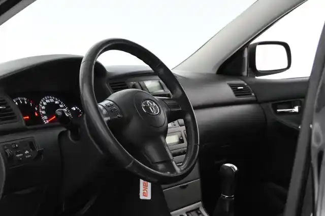 Musta Farmari, Toyota Corolla – JGF-380