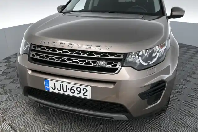 Harmaa Maastoauto, Land Rover Discovery Sport – JJU-692