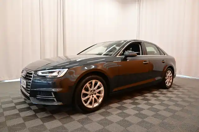 Harmaa Sedan, Audi A4 – JLU-394