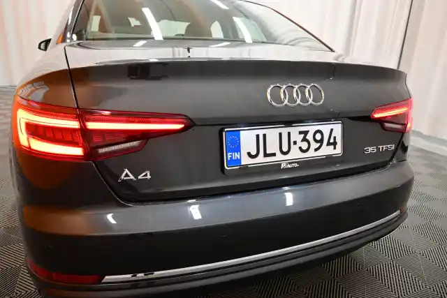 Harmaa Sedan, Audi A4 – JLU-394