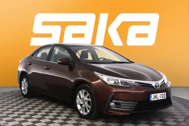 Ruskea Sedan, Toyota Corolla – JNL-102