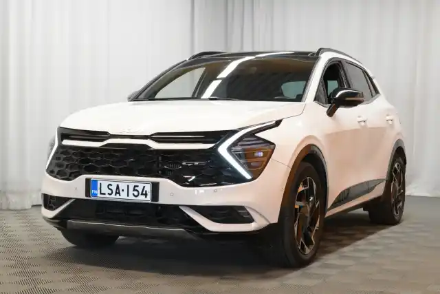 Valkoinen Maastoauto, Kia Sportage – LSA-154