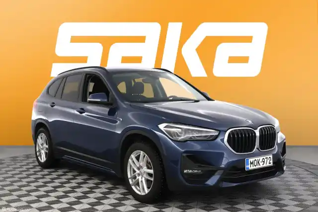 Sininen Maastoauto, BMW X1 – MOK-972