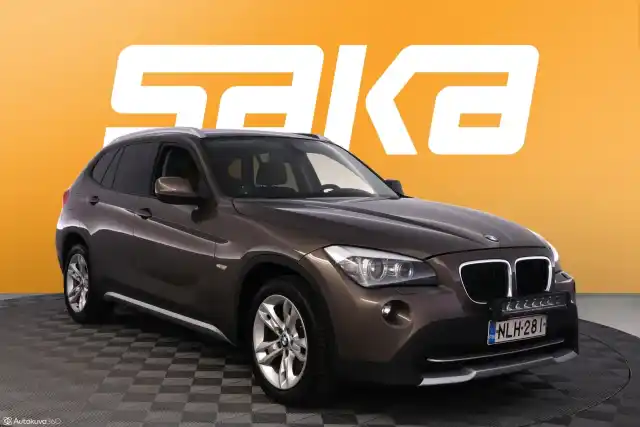 Ruskea Maastoauto, BMW X1 – NLH-281