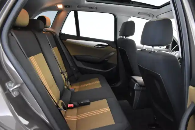 Ruskea Maastoauto, BMW X1 – NLH-281