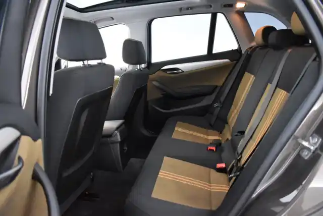 Ruskea Maastoauto, BMW X1 – NLH-281