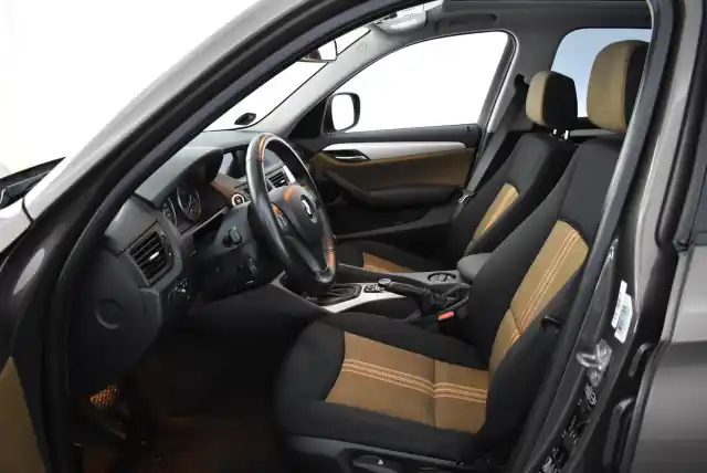 Ruskea Maastoauto, BMW X1 – NLH-281