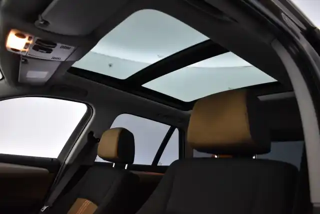 Ruskea Maastoauto, BMW X1 – NLH-281