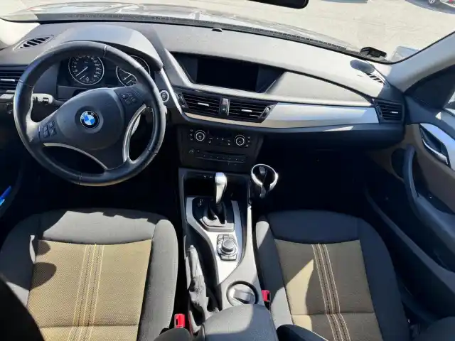 Ruskea Maastoauto, BMW X1 – NLH-281