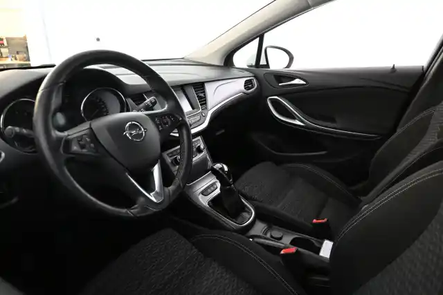 Valkoinen Farmari, Opel Astra – RST-779