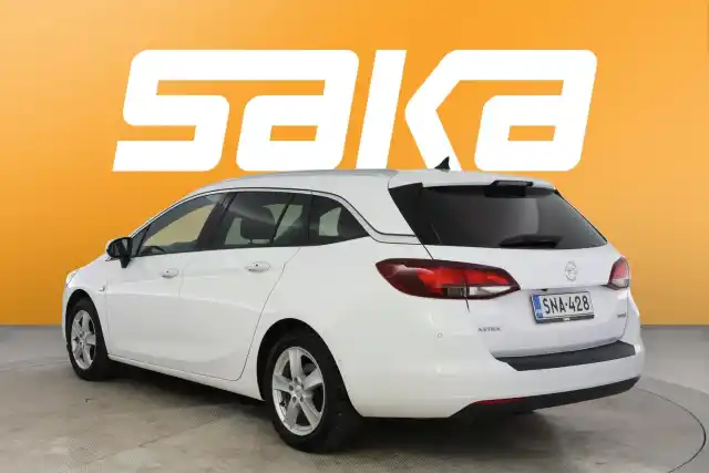 Valkoinen Farmari, Opel Astra – SNA-428