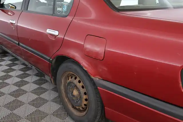 Punainen Henkilöauto, Nissan Primera – TGP-738
