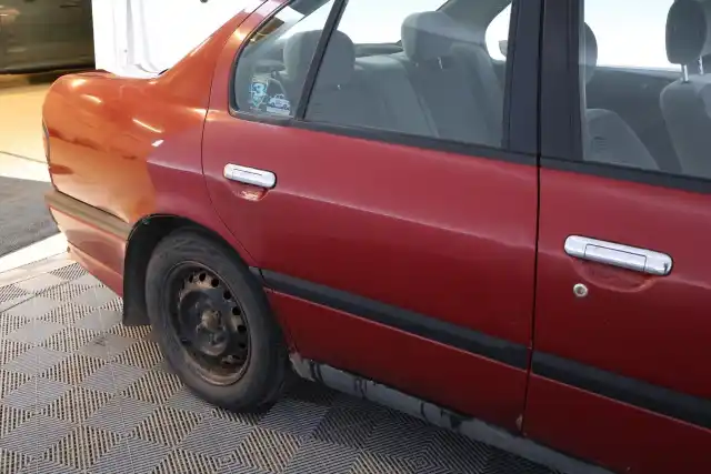 Punainen Henkilöauto, Nissan Primera – TGP-738