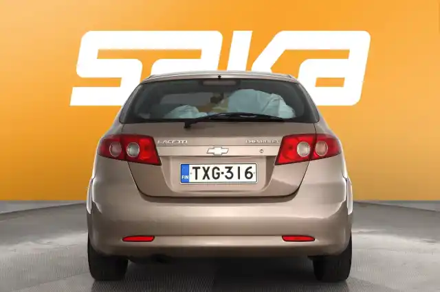 Beige Henkilöauto, Chevrolet Lacetti – TXG-316