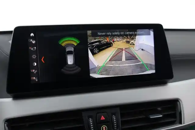 Valkoinen Maastoauto, BMW X1 – VAR-01702