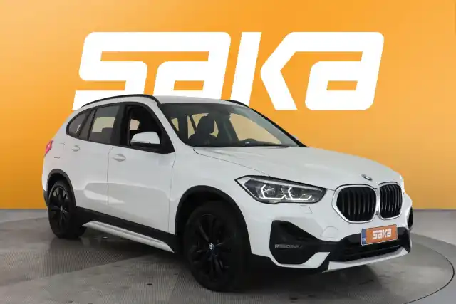 Valkoinen Maastoauto, BMW X1 – VAR-12637