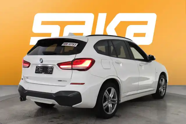 Valkoinen Maastoauto, BMW X1 – VAR-16476