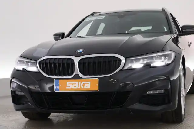 Musta Farmari, BMW 330 – VAR-50658