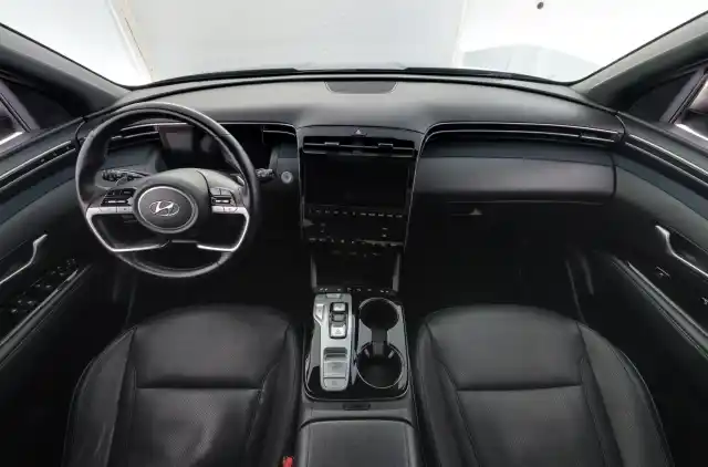 Harmaa Maastoauto, Hyundai Tucson – XSL-411