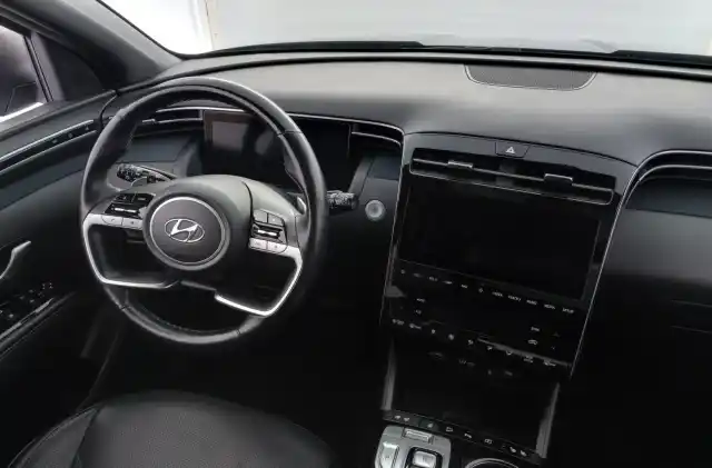 Harmaa Maastoauto, Hyundai Tucson – XSL-411