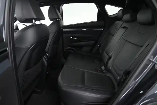Harmaa Maastoauto, Hyundai Tucson – XSL-411