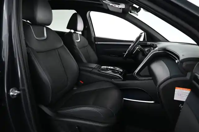 Harmaa Maastoauto, Hyundai Tucson – XSL-411