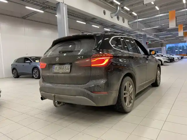 Musta Maastoauto, BMW X1 – YJM-654