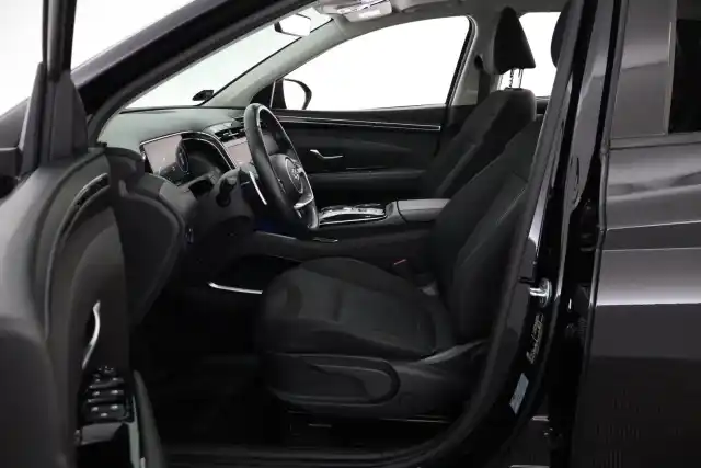 Musta Maastoauto, Hyundai Tucson – YXL-313