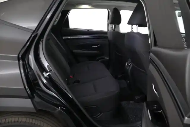 Musta Maastoauto, Hyundai Tucson – YXL-313
