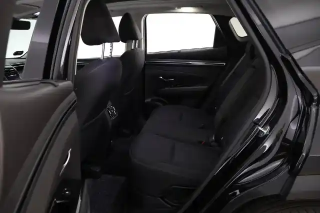 Musta Maastoauto, Hyundai Tucson – YXL-313