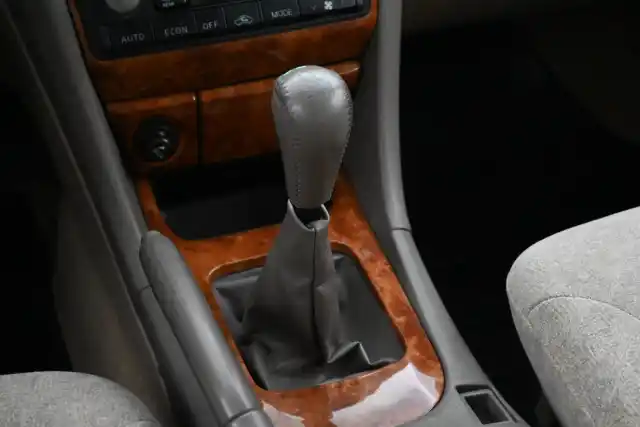 Beige Sedan, Nissan Maxima – ZEG-990