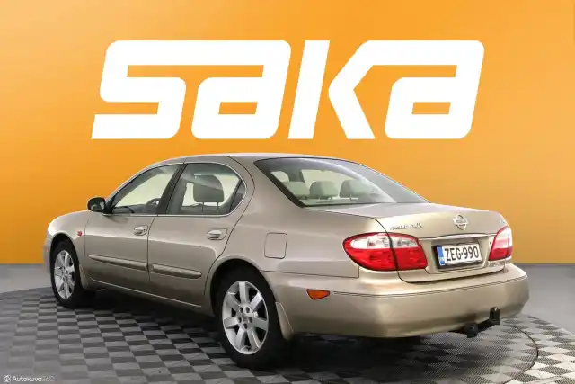 Beige Sedan, Nissan Maxima – ZEG-990