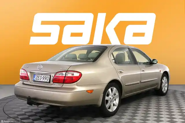 Beige Sedan, Nissan Maxima – ZEG-990