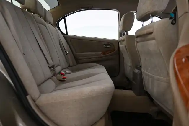 Beige Sedan, Nissan Maxima – ZEG-990