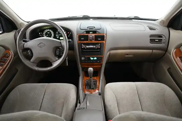 Beige Sedan, Nissan Maxima – ZEG-990